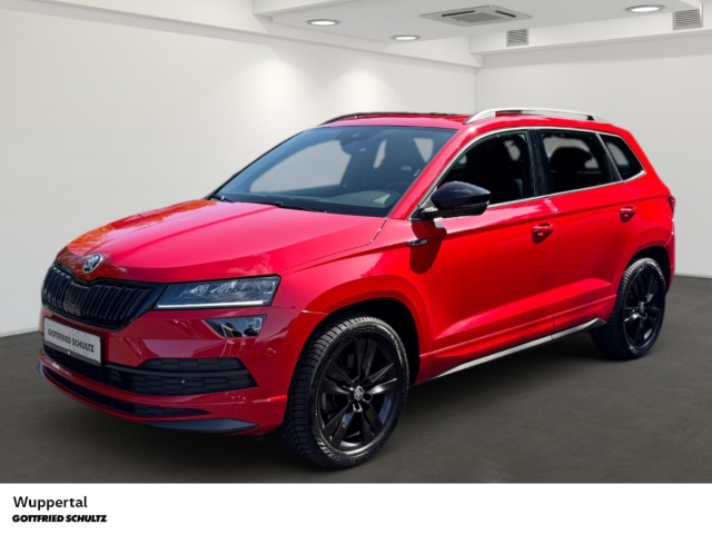 Karoq 2.0 TSI Sportline 4M DSG AHK PANO DCC NAVI KAM LED SHZ PDC LM